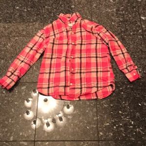 pink and black button up flannel